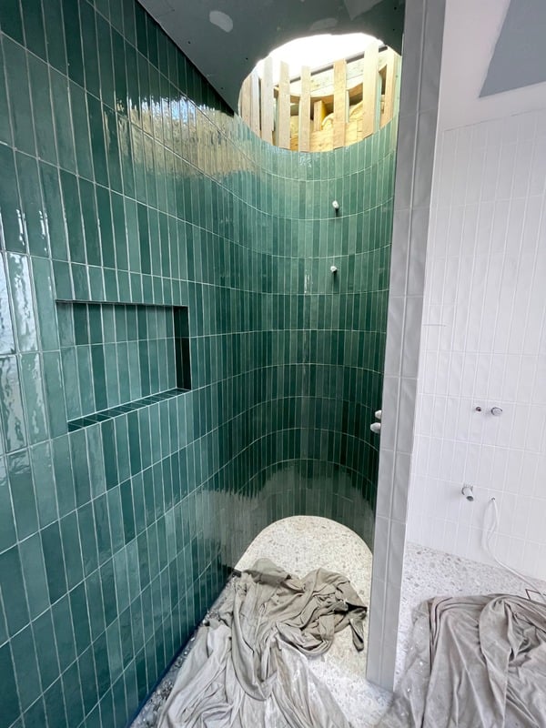 Large-format tiles laid across a residential interior